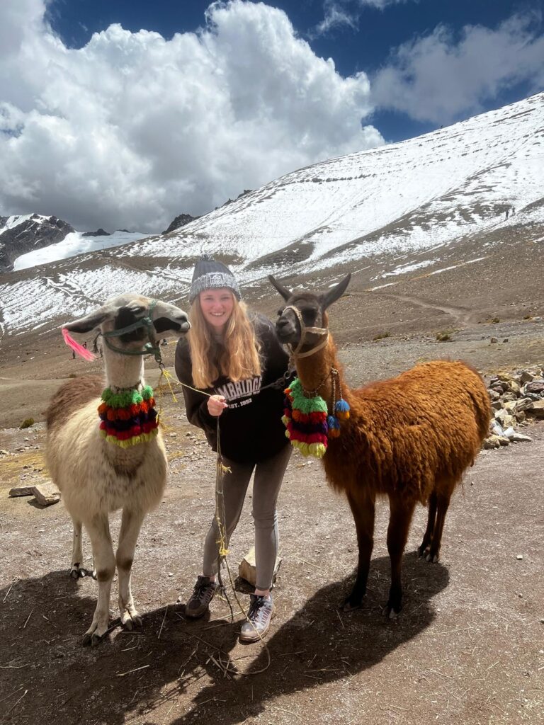 Me at Rainbow Mountains with 2 Llamas