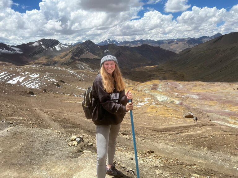 me standing infront of Rainbow Mountains